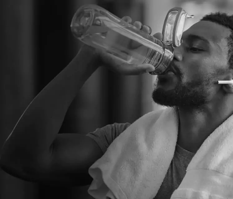A man drinking water