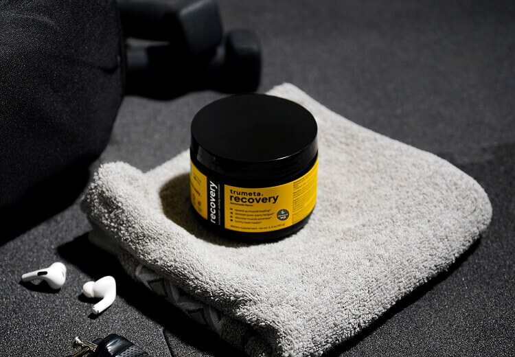 Recovery supplement with towel and dumbbell
